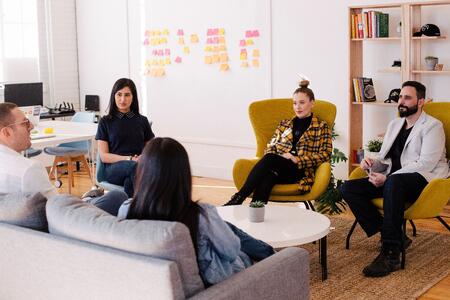 diverse workers sitting at a table